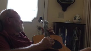 Dad playing guitar 2