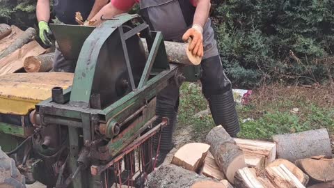 Chopping Wood With a Vintage Machine