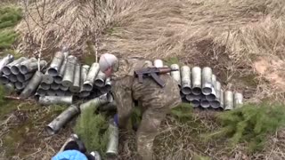 Ukrainian forces fire at Russian positions
