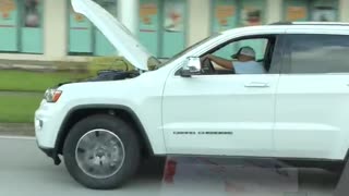 Distracted Driver Rolls with Hood Up