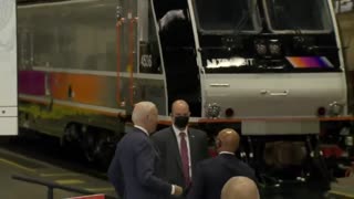 Biden coughs into his hand and then goes around shaking other people’s hands