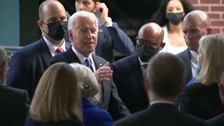 Joe Biden Forgets His Mask, Realizes It and Continues Shaking Hands