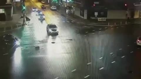 Drunk driver runs red light, hits police car