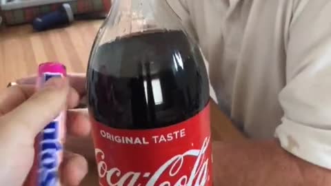 Trick when opening a vial Coca Cola