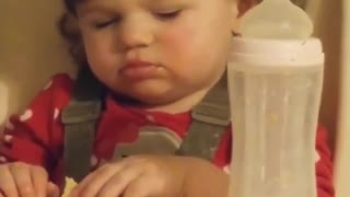 Baby nearly falls asleep while eating meal