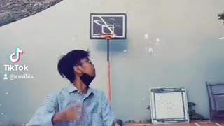 shooting basketball without looking