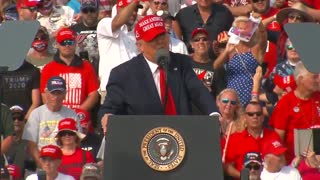 LOL: Woman Tears Up Photos of Pelosi, Schumer, and Schiff Behind Trump at Rally