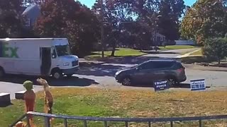 FedEx drivers intentionally mishandling packages at a house with Trump yard signs.