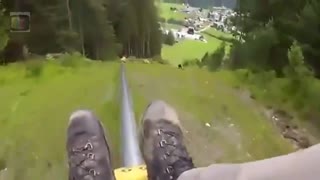 Angry Guy on Alpine Coaster Crashes into Woman