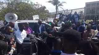 Zandile Gumede addresses crowd outside Durban Commercial Crimes Court