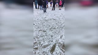 Footballers Continue Game Following Huge Hail Storm