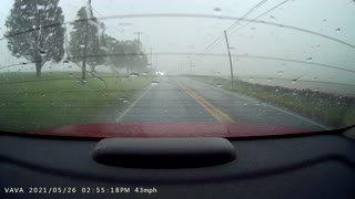 Strong Storms Push Power Lines Onto Road