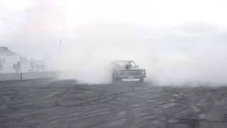 66 Plymouth tearing up the burnout pit