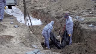 More civilian bodies exhumed from mass grave in Bucha