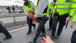 Climate Activist Protesting Against New Oil is Carried Away by Police in Central London