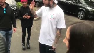 Post Malone meets fans before leaving Australia