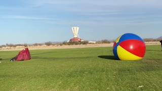 Skydiver Slams Into Giant Beach Ball