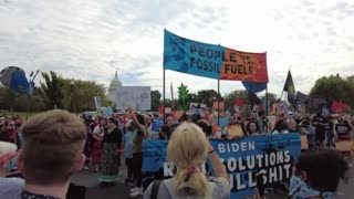 Youth climate protestors take over an intersection by the Capitol building