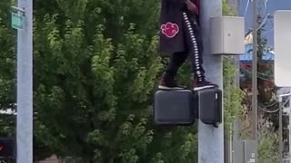Mysterious Traffic Pole Dancer