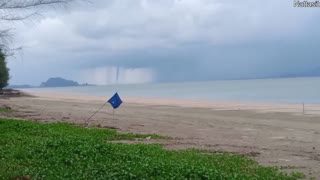 Waterspouts Forming Near Beach