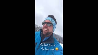 snowboarder gets wiped out while taking selfie