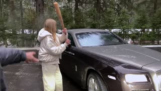 Pretty Blogger Smashes Rolls Royce Windscreen With Bat