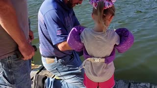 Little Girl Reels in Monster Fish with Mini Pole