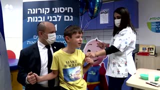 Israeli PM's 9-year-old son gets COVID vaccine