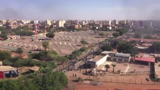 Protesters in Sudan march against military PM deal