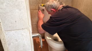 My friend Bill, Installing a new toilet.