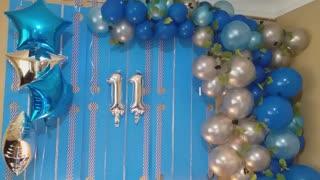 blue and silver balloon decor