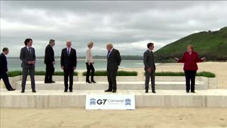World leaders pose for socially-distanced photo for G7
