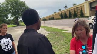 Black guy assaults Female Trump supporter!