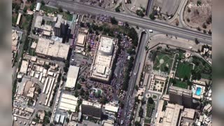 Satellite photos show mass of people surrounding Iraqi Parliament