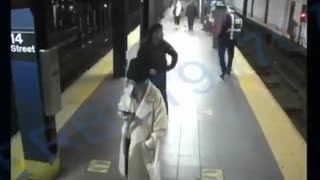 Homeless man shoves woman onto NYC subway tracks