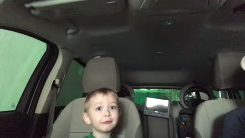 Toddler gets a front seat view of a car wash and he is AMAZED!!!