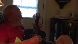 Dad playing guitar 5
