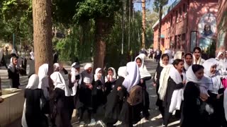 Kabul teacher and student long for return to class