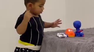 Cute Baby Playing With Little Car