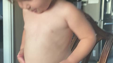 Hilarious 2 year old makes a “belly bagel”