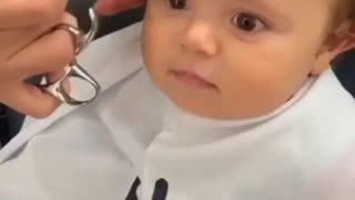Adorable Baby gets first haircut
