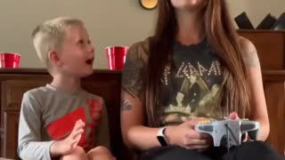 Sweet little kid is a very supportive video game co-pilot