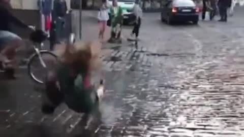 Jumping on a slippery patch of the street