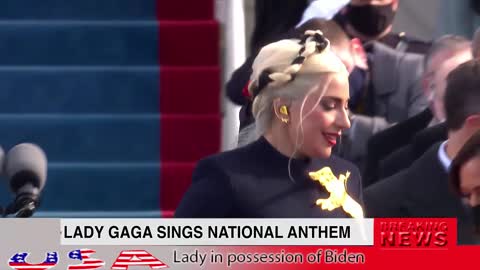 Lady Gaga presents the National Anthem held by Biden