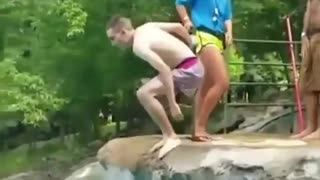 a boy trying to dive for his first time
