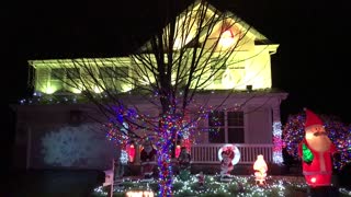 Epic Christmas light show synced to music