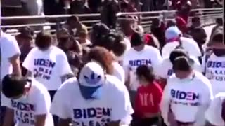 Migrants in Biden Shirts At The Border: Let Us In