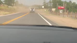 Dust Devil Cuts Through Traffic