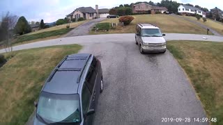 Driver Takes Out Mailbox