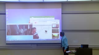 Lecture Room white Board with Math Professor Fixes Projector